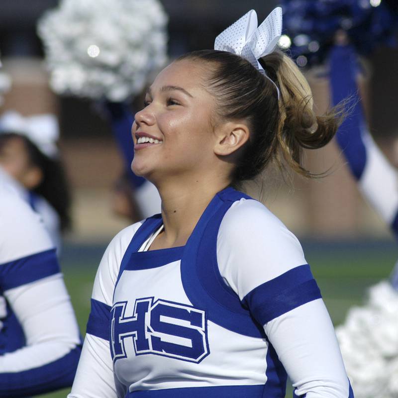 Newman cheerleader Paizlee Williams cheers on her team Saturday. Newman defeated Chicago Hope 50-22 in Class 1A 1st round football at Sterling High School on Saturday, November 2, 2024.