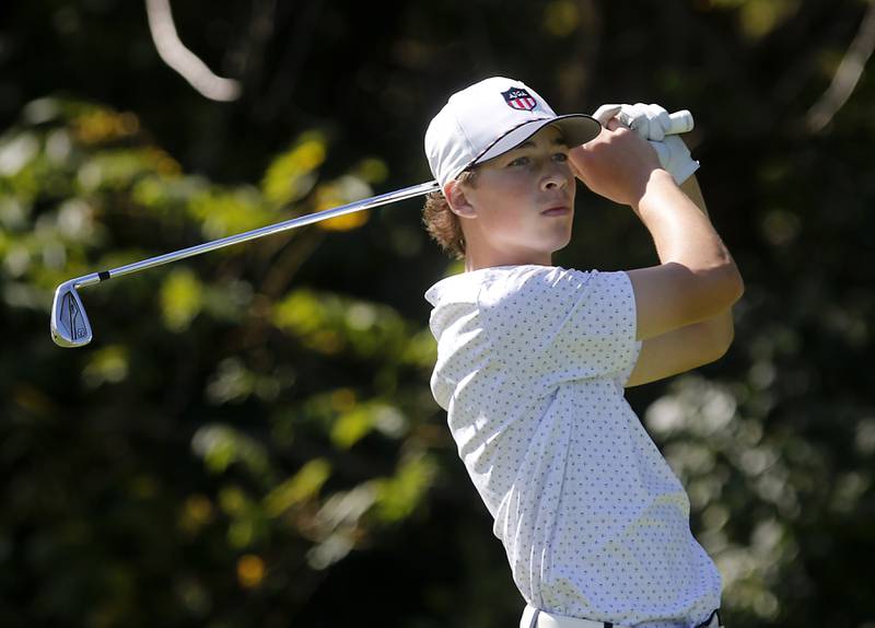 Burlington Central’s Tyler Samaan watches tee shot on the 15th hole  during the Fox Valley Conference Boys Golf Tournament Thursday, Sept. 25, 2025, at Foxford Hills Golf Club in Cary.