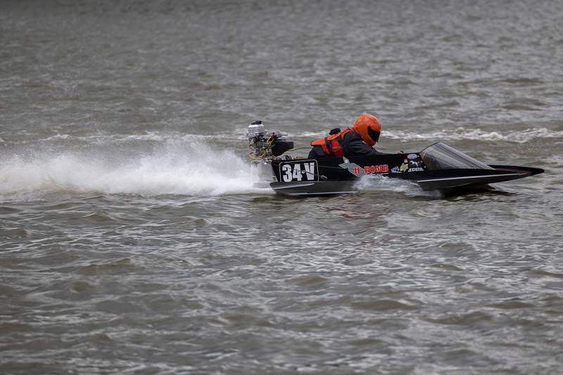 Holden Mackey operates his boat through a race Saturday, July 12, 2025, in Rock Falls. Teams from Illinois, Minnesota, Wisconsin and Iowa spent two days racing on the Rock during the annual River Chase event.