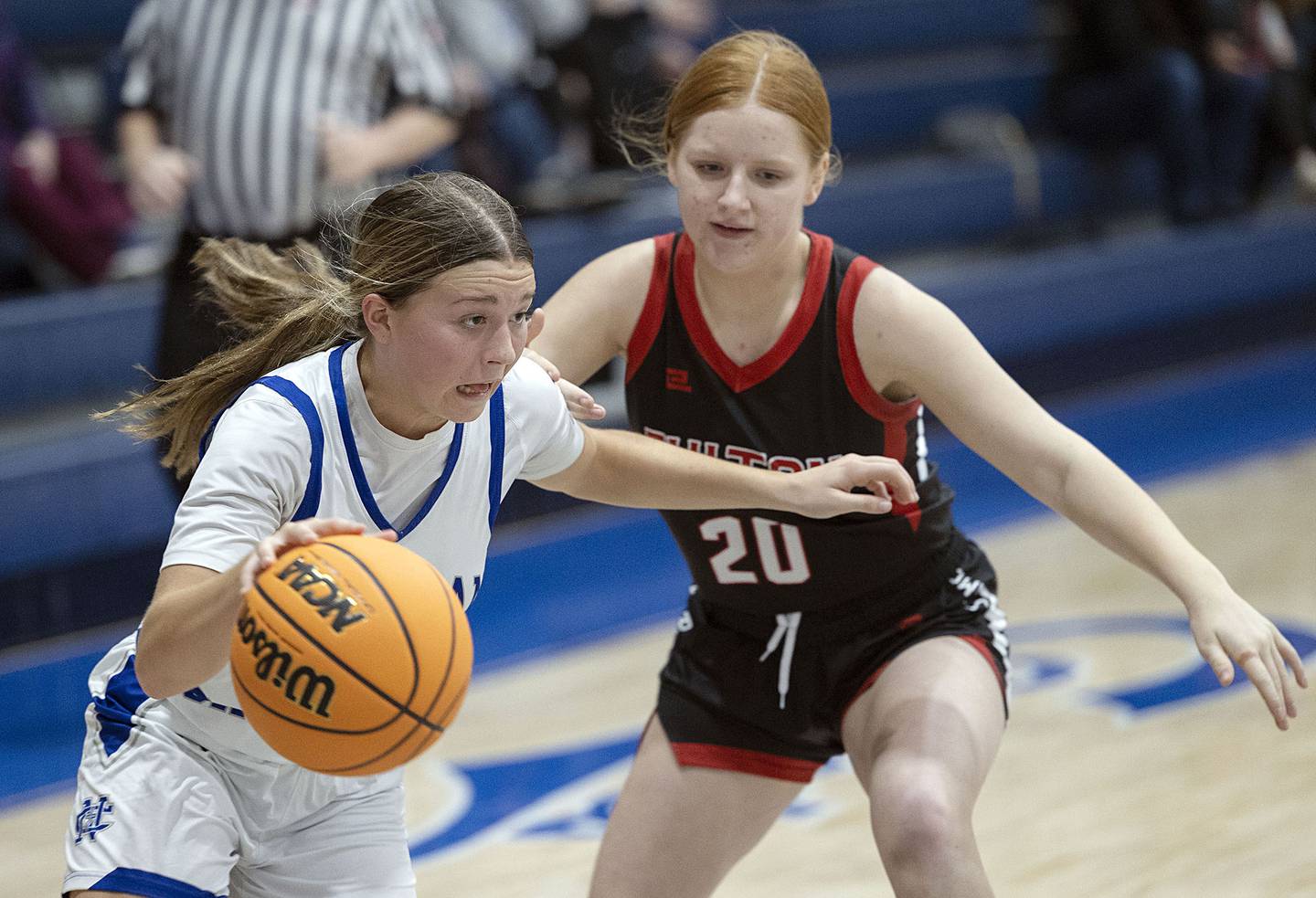 Newman’s Elaina Allen handles the ball against Fulton’s Ariah Mitchell Tuesday, Nov. 25, 2025.