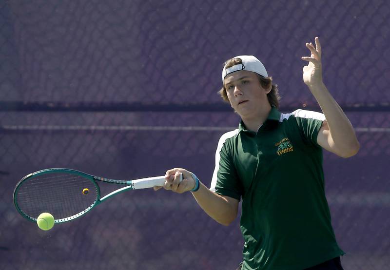 Crystal Lake South’s Eryk Bucior returns the ball as he competes in the Class 1A Boys Doubles State Tennis Tournament on Thursday, May 23, 2024, at Rolling Meadows High School in Rolling Meadows.
