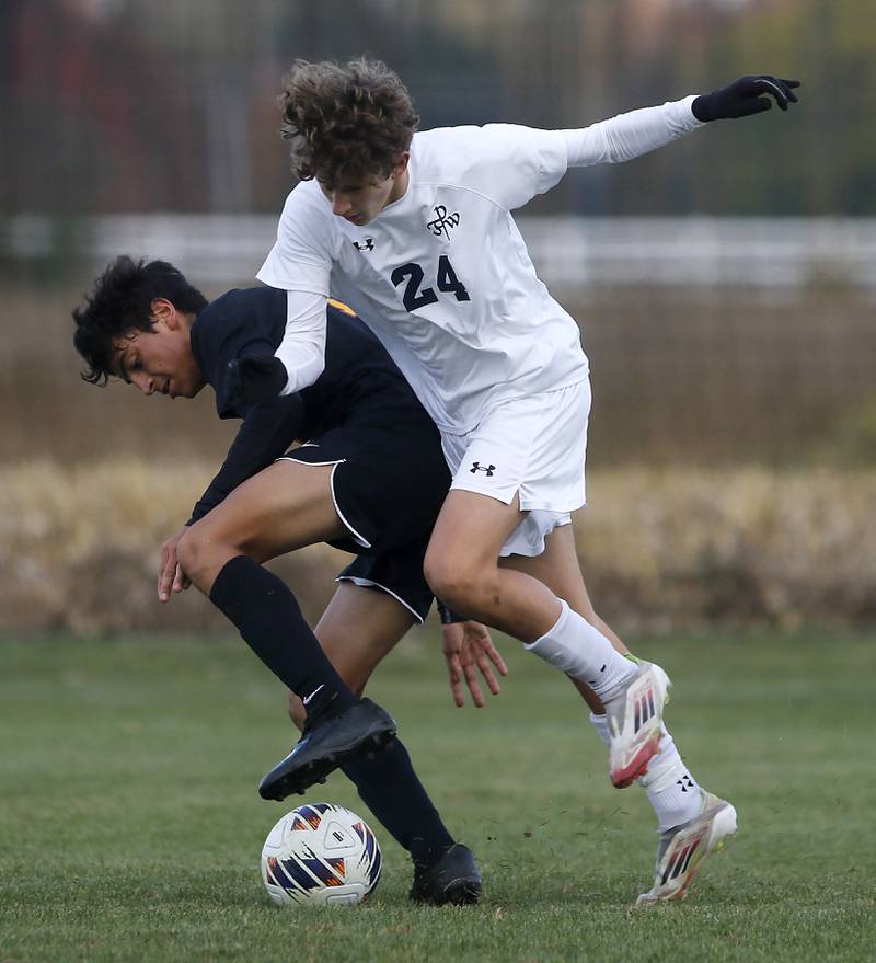 Richmond-Burton's Johann Boentges battles with F.W. Parker's Raffaello Franco for control of the ball during an IHSA Class 1A Johnsburg Sectional semifinal match on Oct. 28, 2025, at Johnsburg High School.