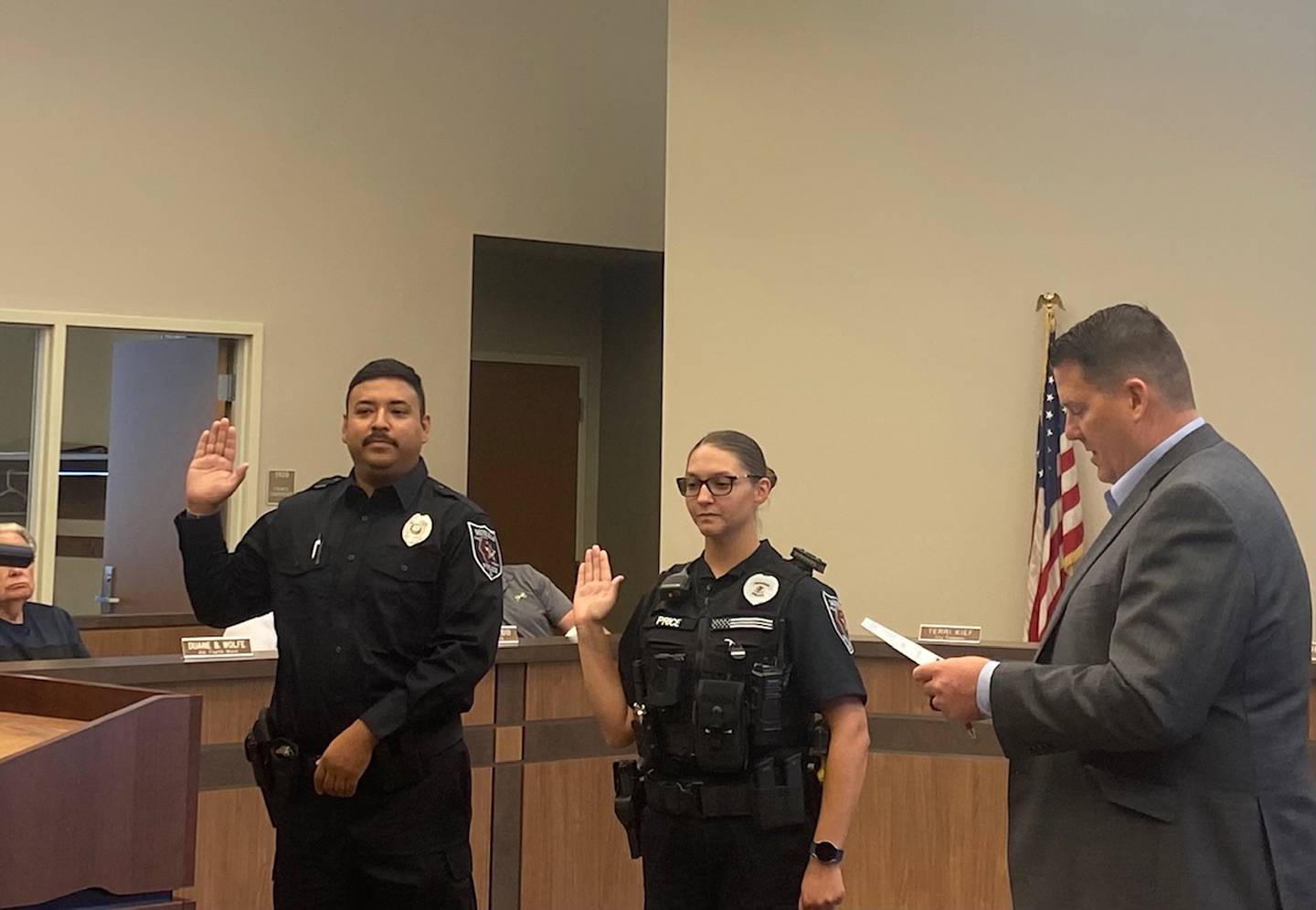 Two police officers swornin during Morris City Council meeting Shaw