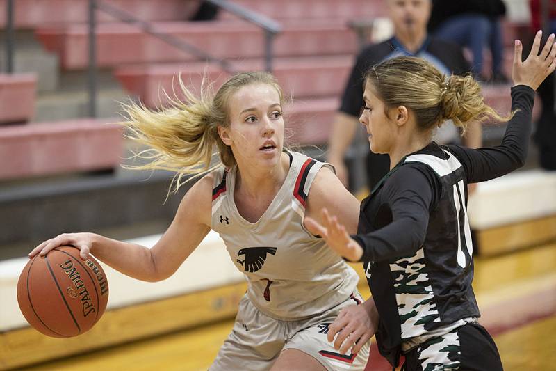 Sauk Valley’s Caylyn Kimmel works against Kishwaukee’s Kira Klapprodt Thursday, Jan. 12, 2023.