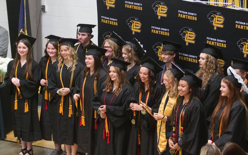 Putnam County HIgh School graduates pose for a photo who earned over 100 hours of community service during the 59th annual Commencement on Sunday, May 18, 2025 in R.M. Germano gymnasium.