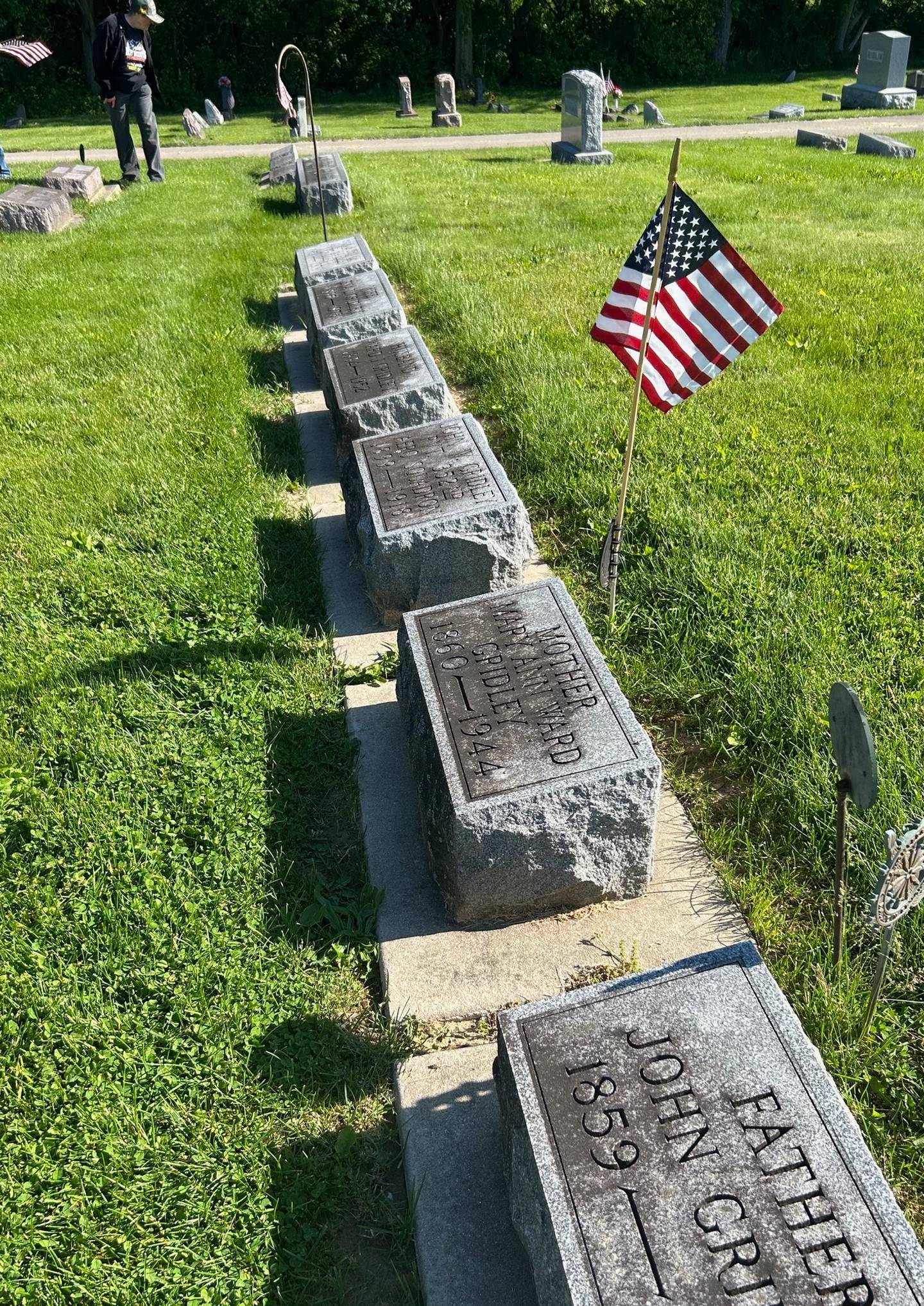 An American flag adorns the grave of John W. Gridley on Saturday, May 18, 2024, at Morrison's Grove Hill Cemetery.