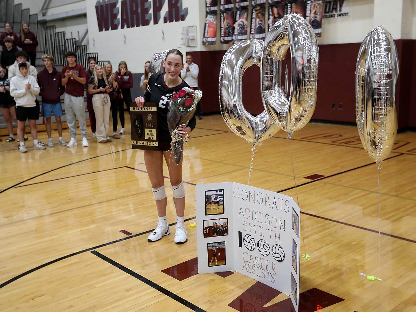Prairie Ridge's Addison Smith celebrates her 1,000 career assist after Prairie Ridge defeated Crystal Lake South in the IHSA Class 3A Prairie Ridge Regional championship volleyball match on Thursday, Oct. 30, 2025, at the Prairie Ridge High School in Crystal Lake.