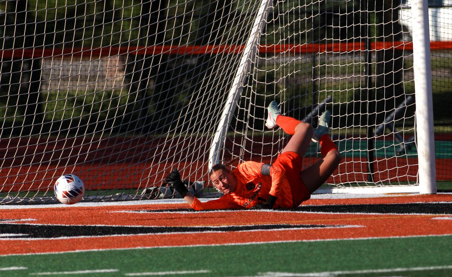 St. Charles East goal keeper Sidney Lazenby makes a save during the Class 3A St. Charles East Regional final against Geneva on Friday, May 23, 2025 in St. Charles.