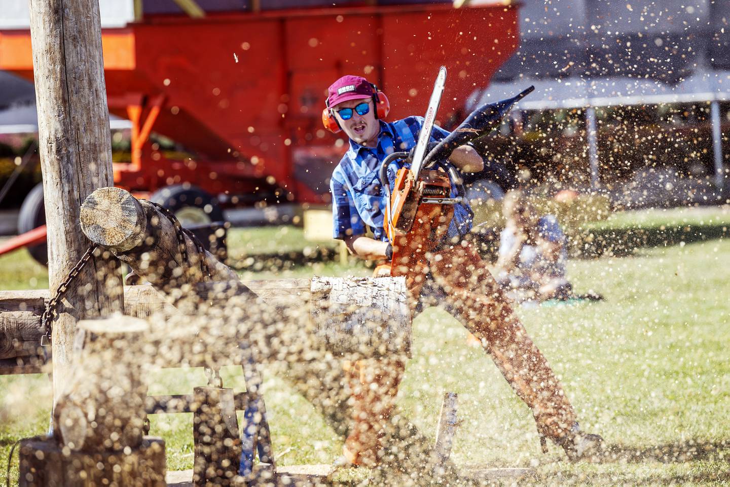 In a cloud of sawdust Tim Knutson finishes the hot saw event Saturday, October 5, 2024, during Rock Falls Tourism’s Lumberjack Show.