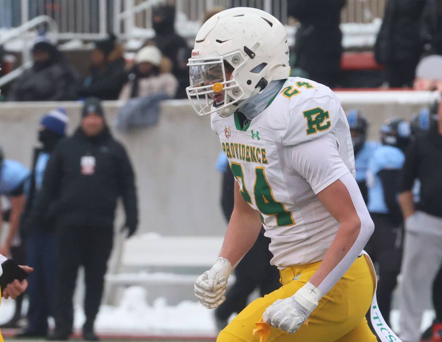Providence Catholic's Broden Mackert reacts after scoring a touchdown during the Class 5A State championship on Tuesday, Dec. 2, 2025 in Hancock Stadium at Illinois State University in Normal.