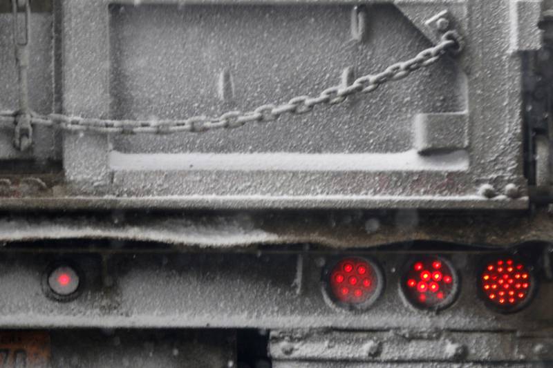 Taillights, chain links and snow on Wednesday, Feb. 11, 2025, in Fox Lake.