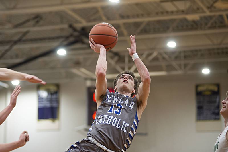 Newman's Nolan Britt puts up a shot against Scales Mound in the sectional final Friday, March 4, 2022.