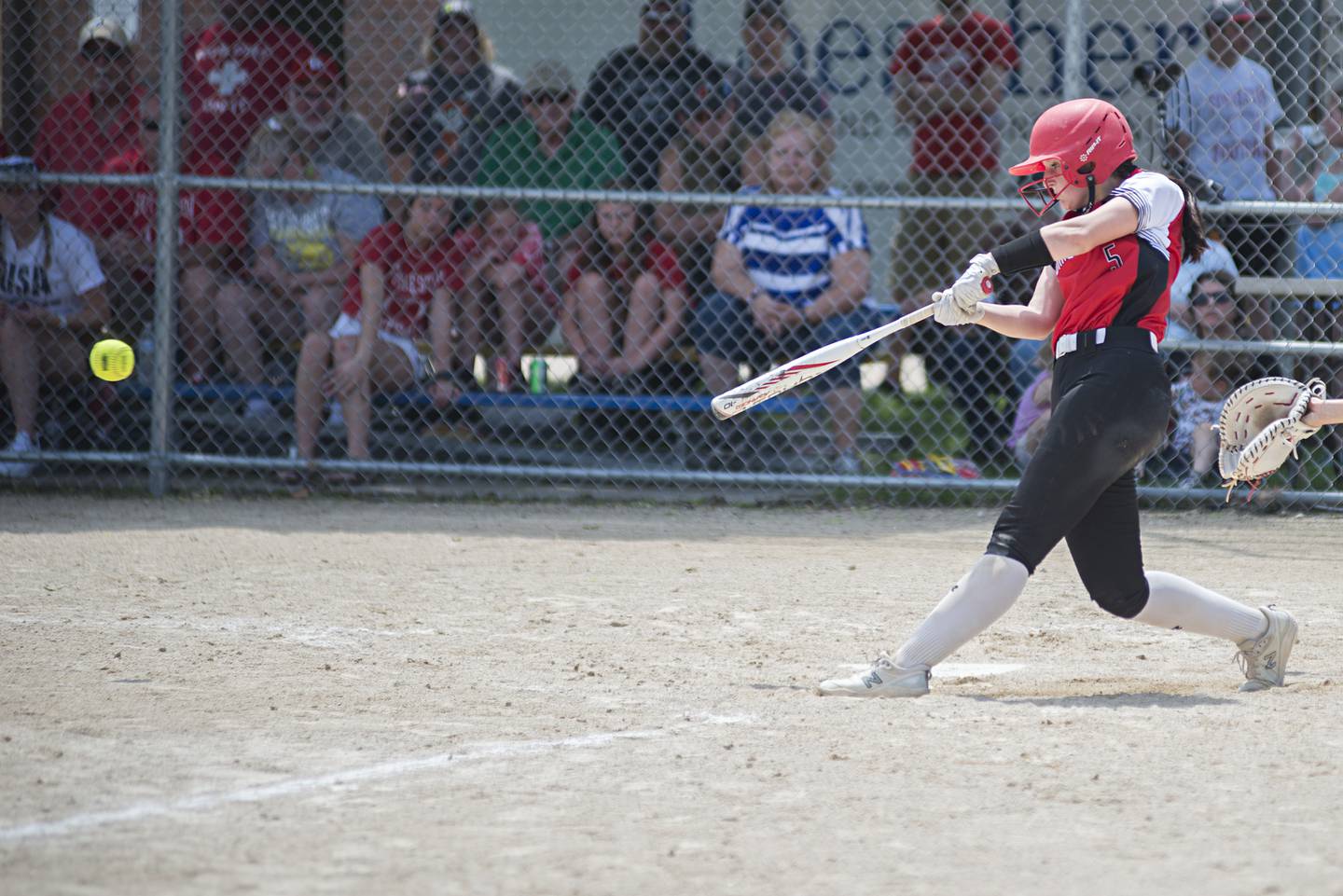 Forreston’s Hailey Greenfield drives the ball for two RBI’s against West Central Monday, May 30, 2022.