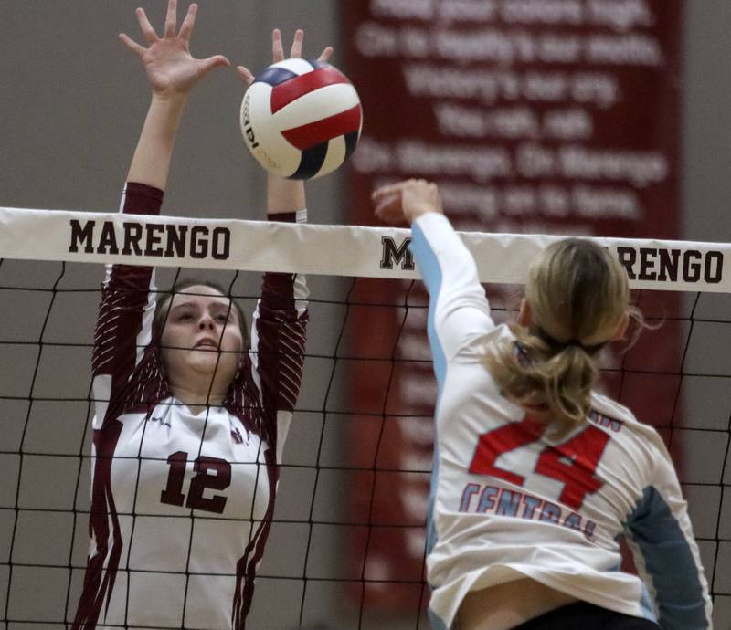 Marengo’s Addison Sanchez blocks against Marian Central in IHSA Class 2A Regional volleyball action on Monday, Oct. 28, 2024, at  Marengo High School  in Marengo.