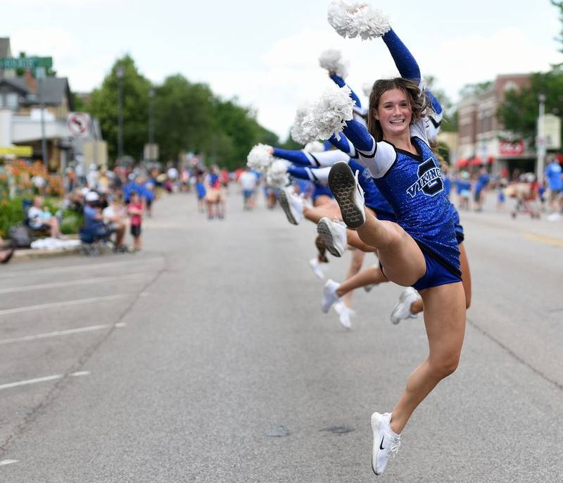 Avery Cook and the Geneva High School dance team do a number during Sunday's Swedish Days parade.