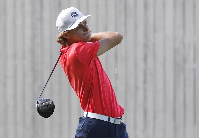 Dundee-Crown’s Jake Russell watches his tee shot on the 18th hole during the Fox Valley Conference Boys Golf Tournament. Thursday, Sept. 22, 2022, at Randall Oaks Golf Club in West Dundee.