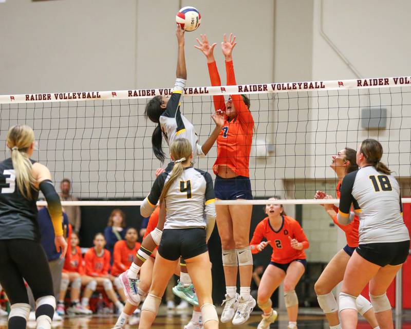 Oswego's Hannah Herrick (7) attempts a block during Class 4A Bolingbrook Sectional semifinal match between Joliet West at Oswego.  Nov 5, 2024  in Bolingbrook.