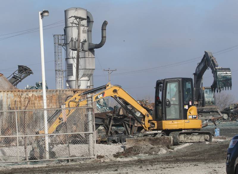 Excavators move debris near the entrance of LSC Environmental Products (formally Phoenix Paper Products) on Monday, Feb. 5, 2024 near Lostant. This comes two-weeks after a massive three-alarm fire destroyed the business. Lostant Fire Department has been out to the site several times since the fire for rekindles.