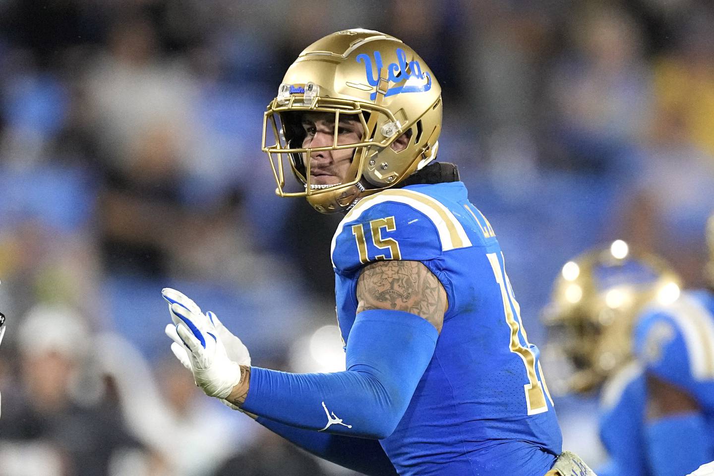 UCLA defensive lineman Laiatu Latu runs a play during the first half against Coastal Carolina Saturday, Sept. 2, 2023, in Pasadena, Calif.