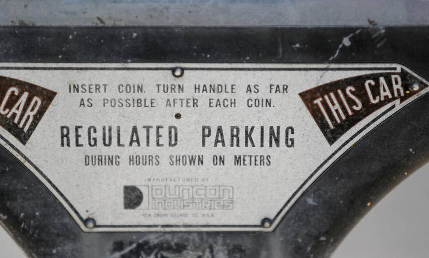 Joliet has removed parking meters like these from a one-block section of Van Buren Street downtown where an electronic parking kiosk has been installed.