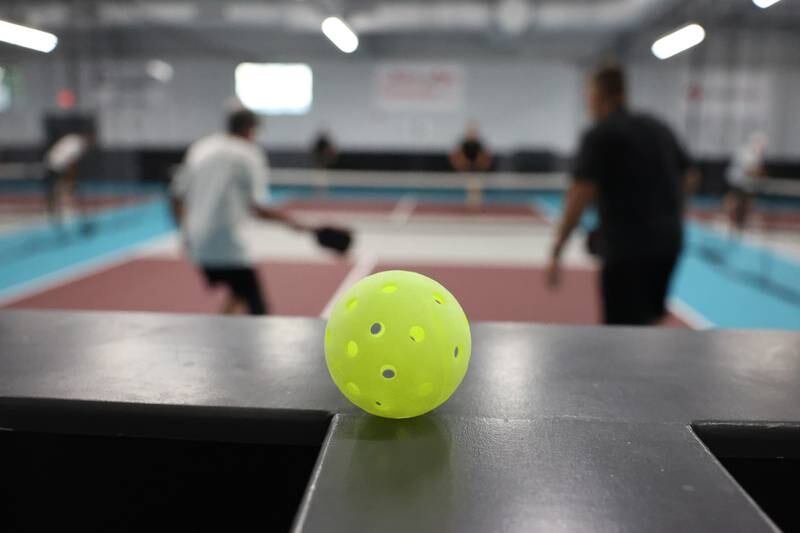 Len Larsen describes pickleball like “playing ping pong but standing on the table.”
