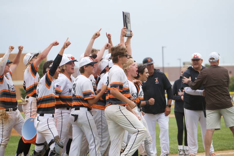 McHenry celebrates the win over Huntley at the Class 4A Sectional Final on June 4, 2022 in Algonquin.