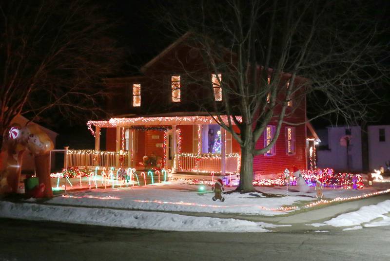 A view of a home decked out in Christmas lights in the 1800 block of 1st Street on Wednesday, Dec. 17, 2025 in Peru.