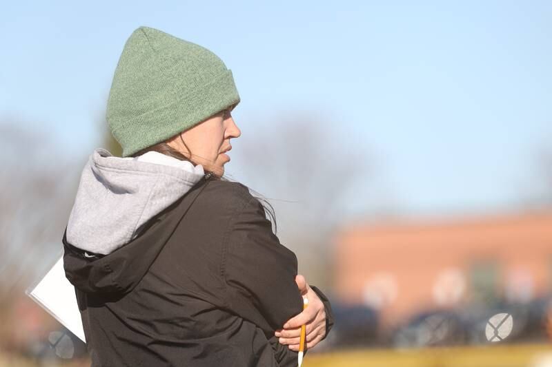 Plainfield Central head coach Kate Welsh manages from thrid base against Bolingbrook on Wednesday, March 20, 2024.