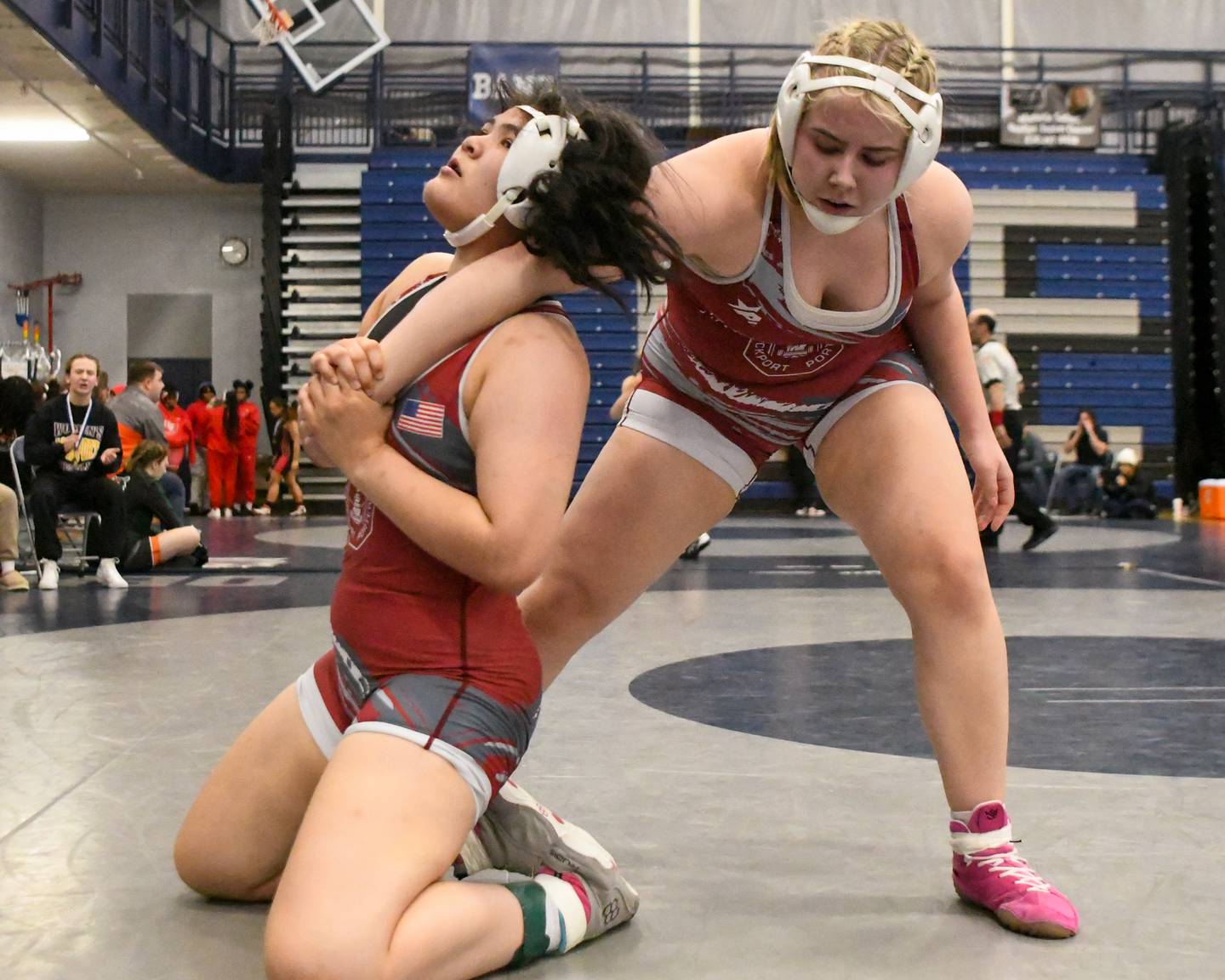 Myra Vicencio, left, of Lockport keeps a hold of Sophie Kelner of Lockport in the championship match during the 190-weight class where Sophie took a 12-3 major decision on Saturday Jan. 4, 2025, during the Aaron Dundley invite held at Oswego East High School.