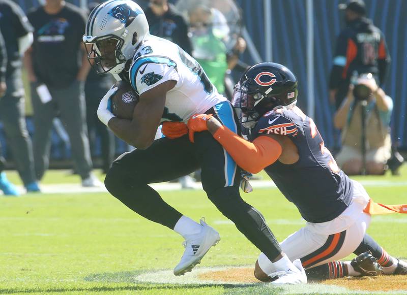 Carolina Panthers wide receiver David Moore is taken down by Chicago Bears defensive back Kevin Byard III on Sunday, Oct. 6, 2024 at Soldier Field in Chicago.