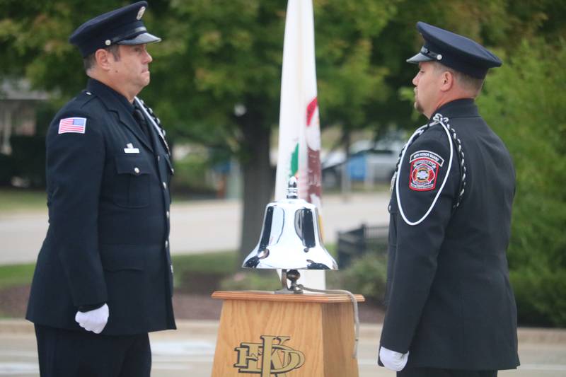 Members of the honor guard are seen approaching a silver bell Thursday, Sept. 11, 2025, in the DeKalb Fire Department's annual Patriot Day Ceremony.