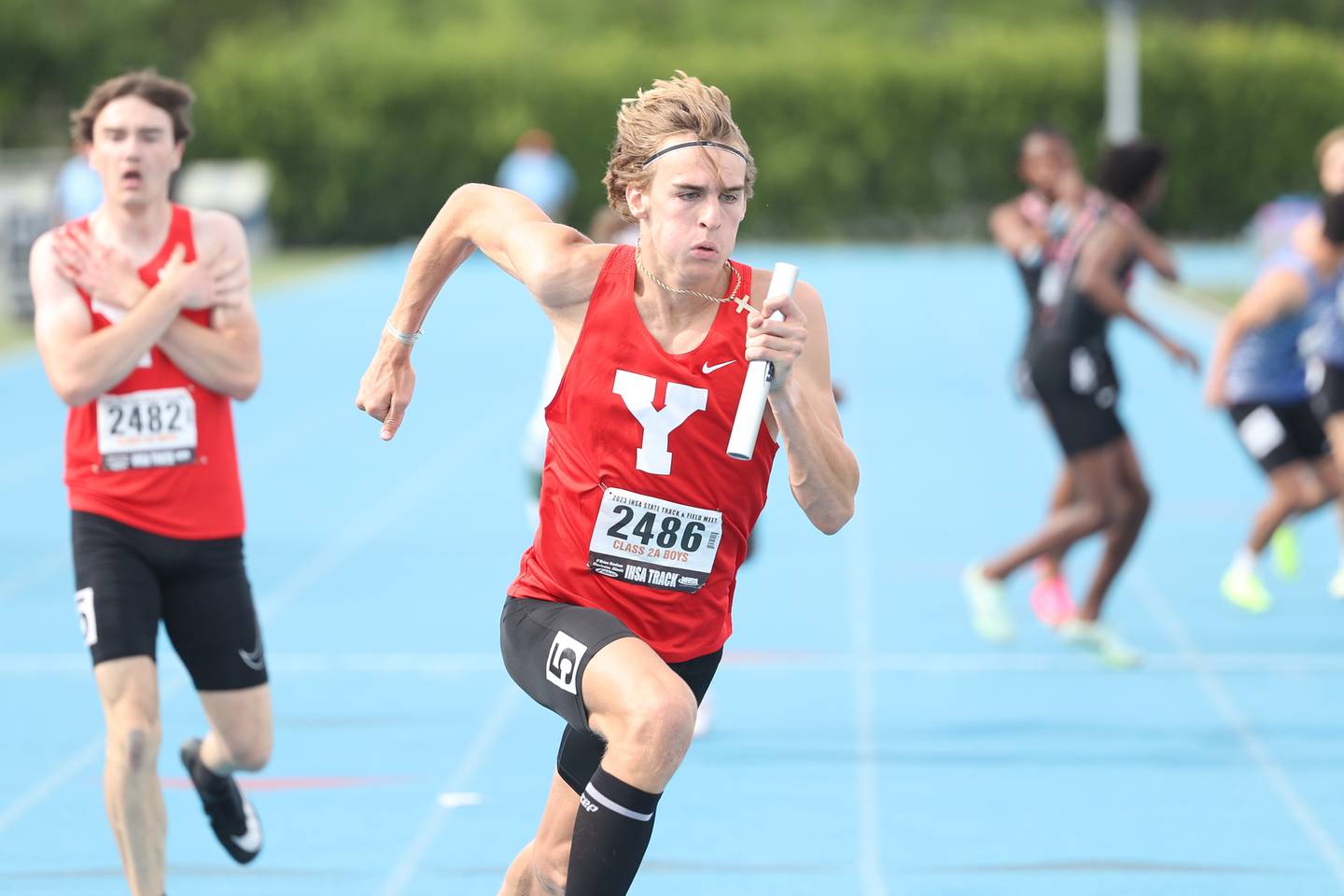 Yorkville’s Elliot Goodwin takes the baton in the Class 2A 4x400 Meter Relay State Finals on Saturday, May 27, 2023 in Charleston.
