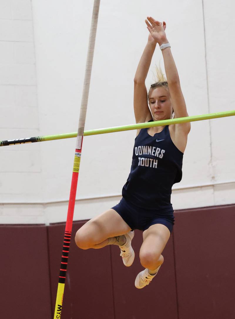 Downers Grove South's Kailee Rodeck clears the bar in the pole vault during the girls varsity track and field 3A Lockport sectional on Friday, May 12, 2023.