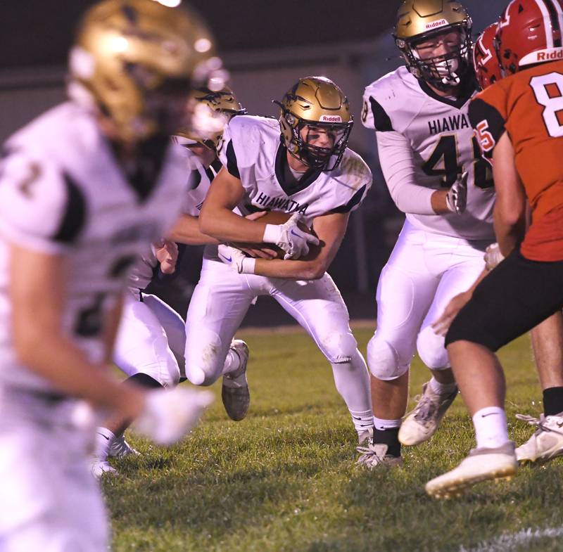 Hiawatha's Cole Brantley gets the handoff and looks for running room during Friday. Sept 30 action in Amboy.
