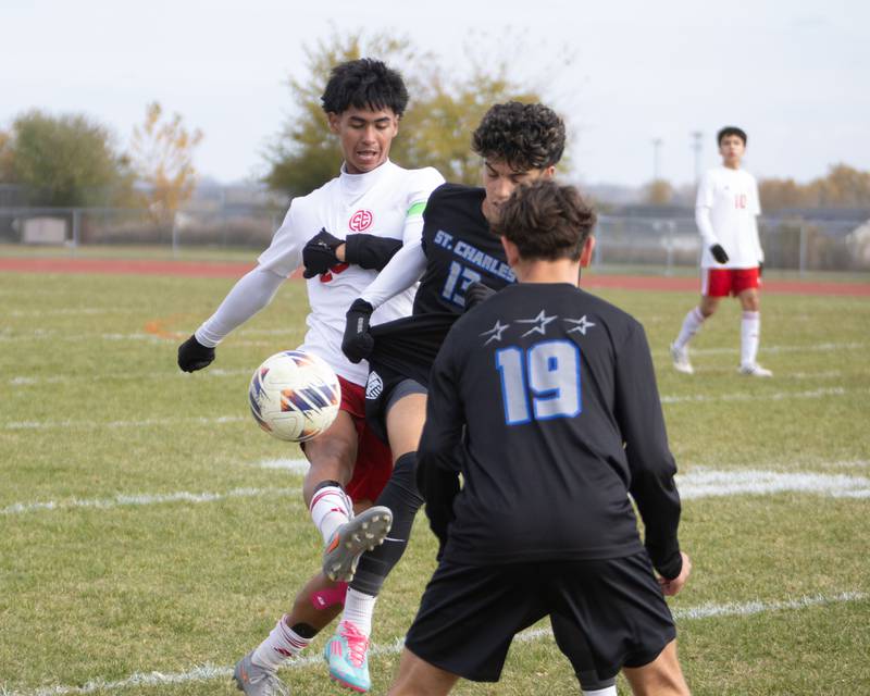 South Elgin's Pablo Correa battles for the ball with St. Charles North's Max Dzioban at the Class 3A Sectional Final on Saturday, Nov. 1,2025 in South Elgin.