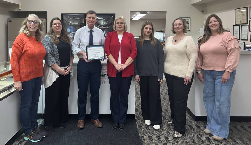 (From left) Judy Booze, Streator Chamber ambassador; Beth Palm, Streator Chamber Board; Mark VanDuzer, owner of VanDuzer Jewelers; Naomi Hauser; Emily Pratt; Amber Miller, Streator Chamber executive director; and Dana Stillwell, Chamber Board member celebrate VanDuzer Jewelers being named Streator Chamber's October 2024 Business of the Month.