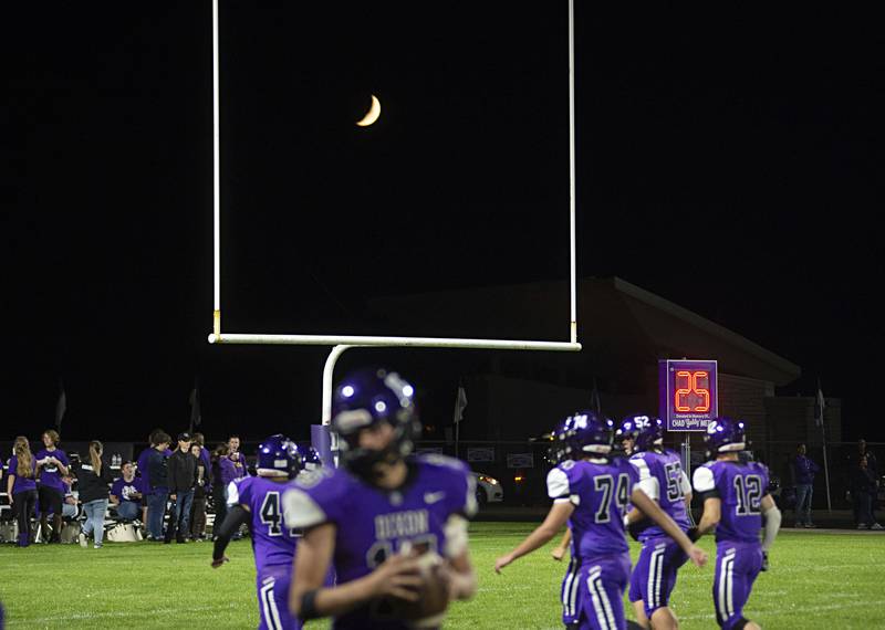 A quarter moon splits the uprights Friday, Sept. 30, 2022 during the Dixon football game.