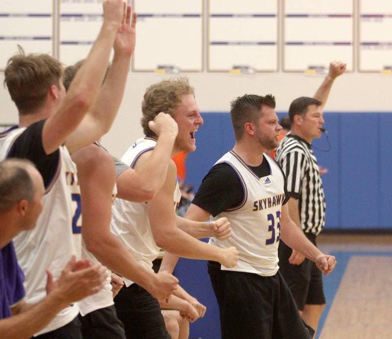Johnsburg’s Skyhawks cheer during an alumni basketball game at Johnsburg High School Saturday evening to benefit the family of Jackson Werderitch, a 10-year-old who was struck by a car.