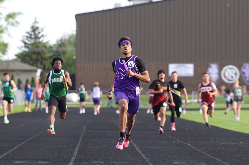 Manteno's Alexsander Lane secures first place in the 4x100 relay race at the Manteno Track Invite on Friday, April 24, 2026.