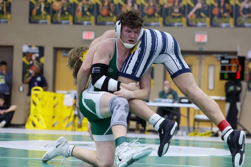 Coal City's Mason Garner wrestles Yorkville Christian's Tyler Gleason in the 165-pound championship match during the IHSA Class 1A Coal City Sectional on Saturday, Feb. 14, 2026.