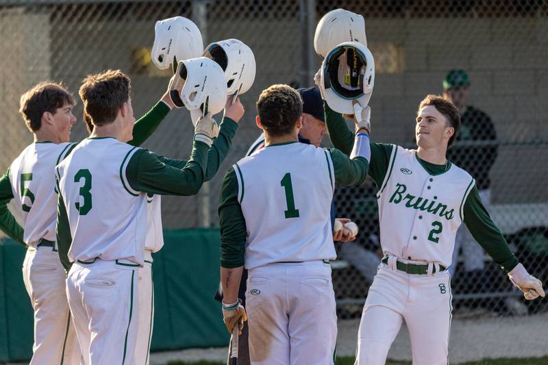 Gus Burr (2) of St. Bede celebrates with team after hitting home run on Tuesday, April 15, 2025 at St. Bede Academy in Peru.
