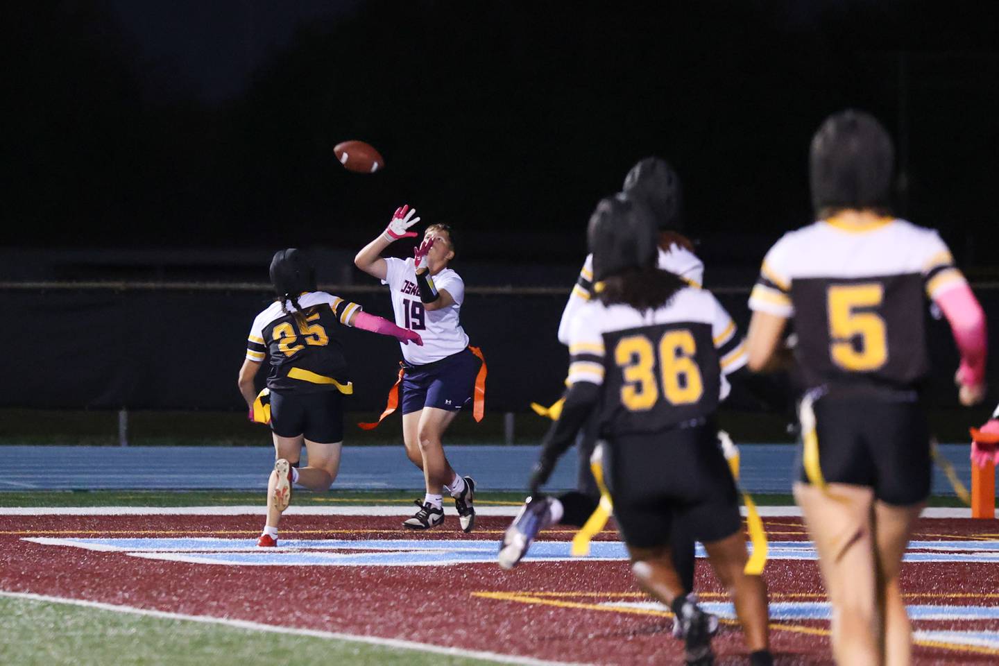 Oswego's Mak Hill catches a touchdown pass during the Panthers' 13-7 victory over Joliet West on Tuesday, Oct. 7, 2025.
