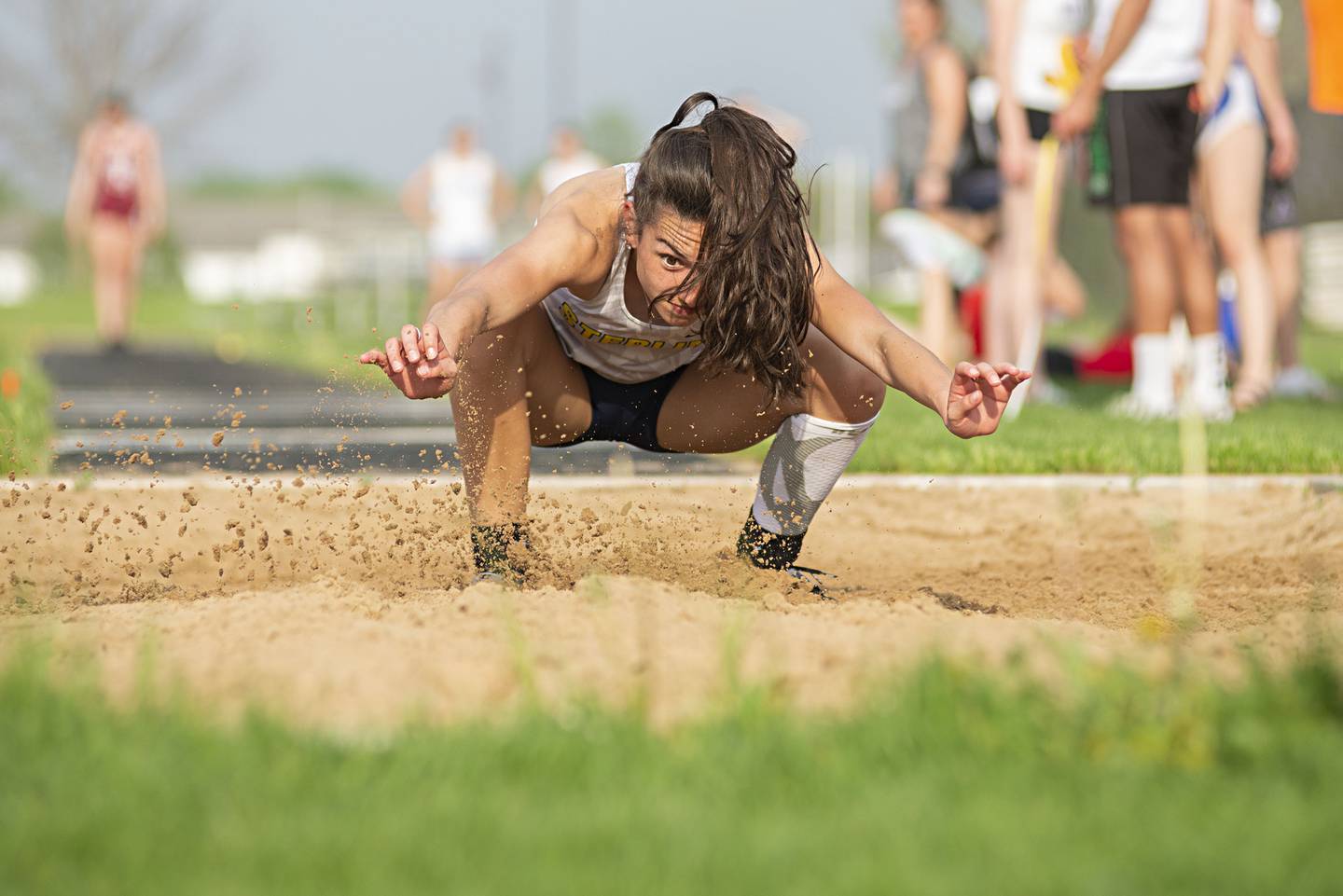 Sterling's Alice Sotelo lands her triple jump to qualify for state at the 2A track sectionals in Geneseo on Wednesday, May 11, 2022.