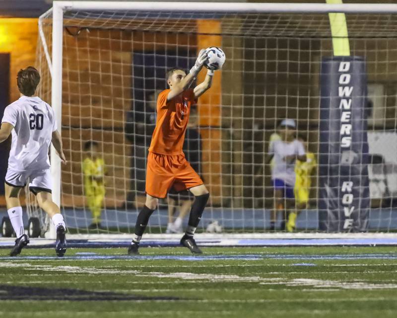 Downers Grove North's Jack Quinn (1) saves a goal during soccer match between Downers Grove North at Downers Grove South. Oct 2, 2025.