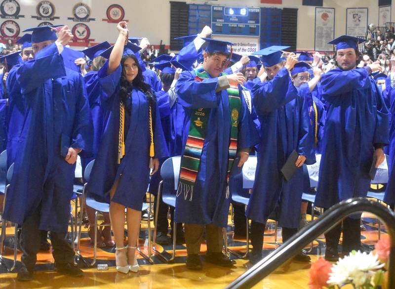 Genoa-Kingston High School graduates move their tassels from left to right Saturday, May 17, 2025, during graduation at the school.
