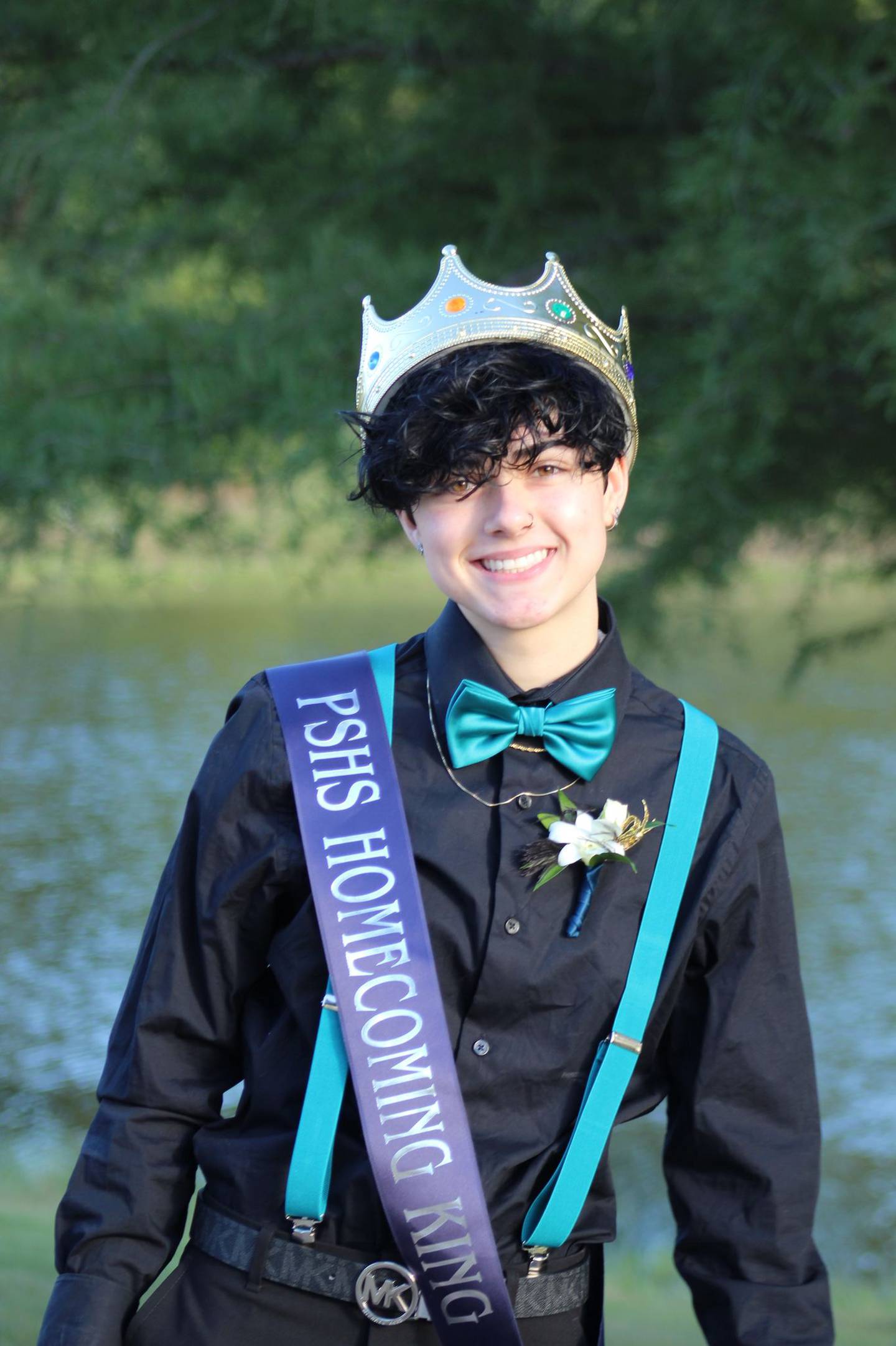 Gianna Pometta is seen at Plainfield South High School's homecoming dance on Saturday night. Pometta and her partner Emily Novak thought they were crowned king and queen but District 202 said no one was king and queen this year; the girls were senior attendants in the court.