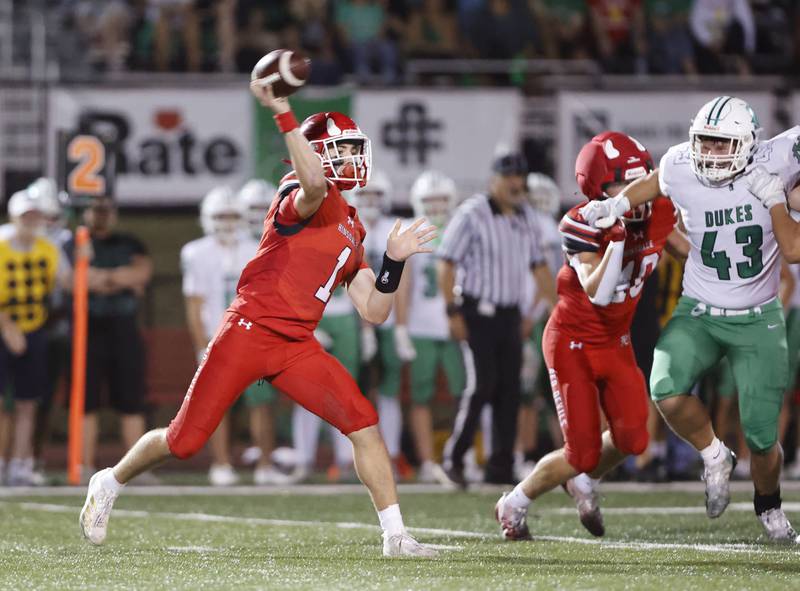 Hinsdale Central's Riley Contreras (1) throws a pass during the varsity football game between York and Hinsdale Central on Friday, Oct. 3, 2025 in Hinsdale, IL.