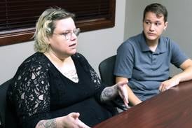 Photos: Beck Garcia and Ash Rootes, of DeKalb Mutual Aid, talk about future plans for the local nonprofit