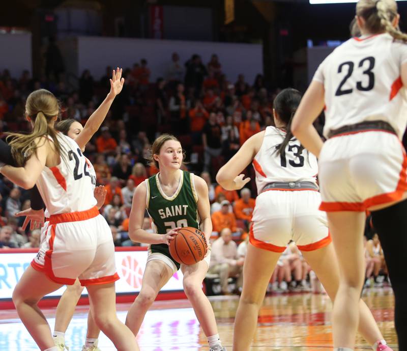 St. Bede's Lili McClain looks to pass the ball against Altamont during the Class 1A third-place game on Thursday, Feb. 29, 2024 at CEFCU Arena in Normal.