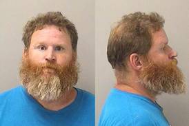 North Aurora man charged in theft of Papa John’s pizza sign